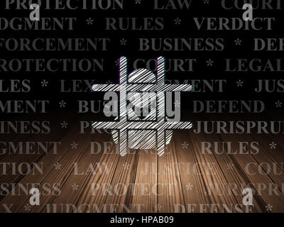 Law concept: Glowing Criminal icon in grunge dark room with Wooden Floor, black background with  Tag Cloud Stock Photo