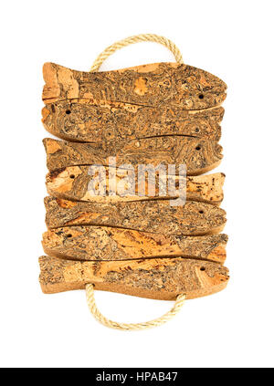 Cork Fish Trivet with rope handles on a white background Stock Photo