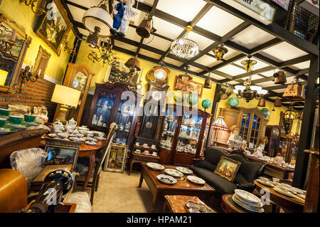 Antique shop interior at the Ratchada Train Market, Bangkok Stock Photo