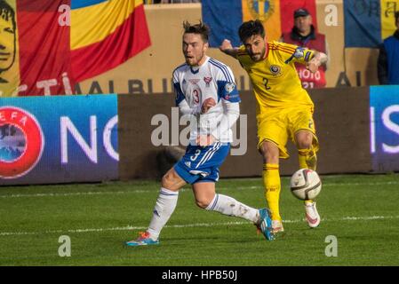 March 29, 2015: Viljormur Davidsen #3 of Faroe Islands National Team and Paul Papp #2 of Romania National Team  in action during the 15th UEFA European Championship Qualifying Round game between  Romania National Football Team (ROU) and Faroe Islands National Football Team (FRO) at 'Ilie Oana' Stadium, Ploiesti in Ploiesti, Romania ROU.   Photo: Cronos/Catalin Soare Stock Photo