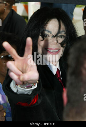 Pop idol Michael Jackson leaves the Santa Maria Courthouse in Santa Maria, California April 30, 2004. Photo credit: Francis Specker Stock Photo