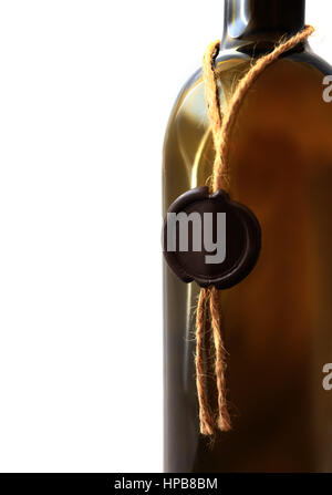 Wine bottle with sealing wax isolated on white background. Retro wine bottle over white background. Stock Photo