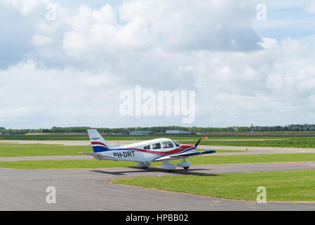 LELYSTAD, NETHERLANDS - MAY 15, 2016: Light aircraft taxiing to the runway on Lelystad airport Stock Photo
