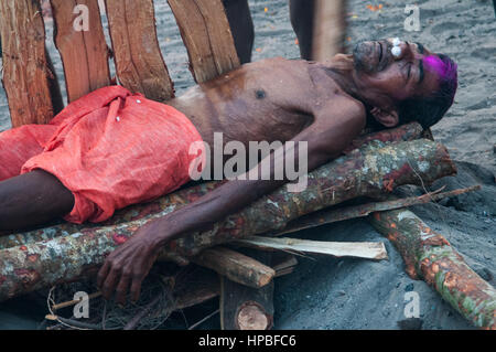 PURI, INDIA:  The body of a man that has to be cremated in Swargadwar crematorium in Puri, India. This sacred site witnesses huge crowds of devotees, which go on increasing every year. Stock Photo