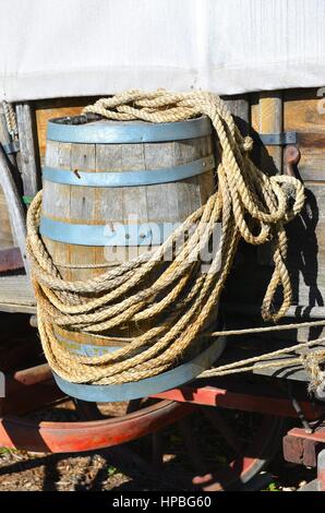 Old Water Barrel and Rope Stock Photo