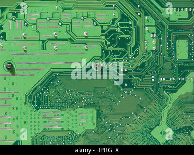 An electronic device for storing and processing data. Mainboard for a personal computer. Computer board. Stock Photo