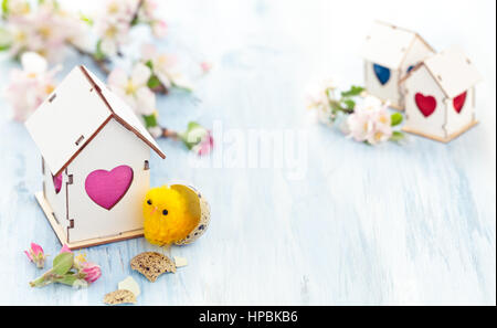 White Wood houses with colorful heart shaped windows. Stock Photo