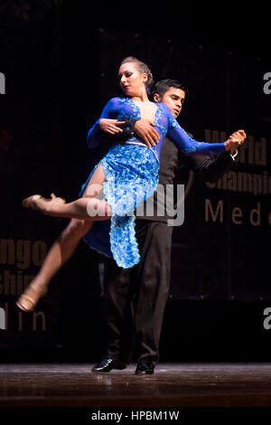 Couple dancing tango in the World Tango Championships, dance competition in the International Tango Festival 2016. Medellin, Colombia. Stock Photo