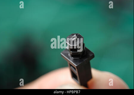 closeup section of plastic part after cut from toy sprue Stock Photo