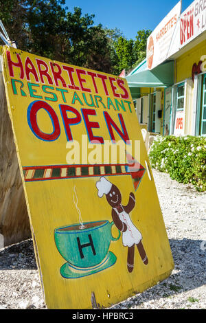 Florida Upper Florida Keys,Tavernier Key,Harriettes,restaurant restaurants food dining cafe cafes,wood sign,hand painted,FL161223019 Stock Photo