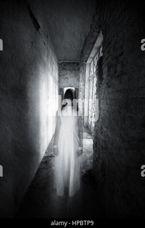 Horror ghost girl appears in an old building. Creepy movie scene Stock ...