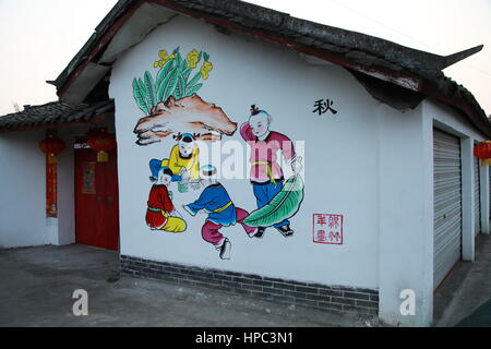 Deyang, Deyang, China. 20th Feb, 2017. Deyang, CHINA-February 20 2017: (EDITORIAL USE ONLY. CHINA OUT) .The wall of a house is decorated with Chinese traditional New Year paintings at a village in Mianzhu, Deyang City, southwest China's Sichuan Province, February 20th, 2017. Various New Year paintings can be seen everywhere in the village. Credit: SIPA Asia/ZUMA Wire/Alamy Live News Stock Photo