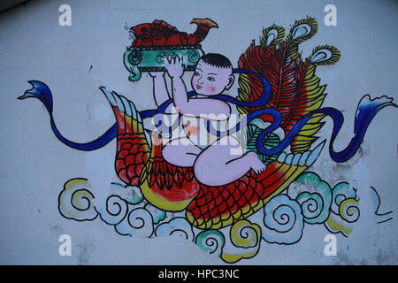 Deyang, Deyang, China. 20th Feb, 2017. Deyang, CHINA-February 20 2017: (EDITORIAL USE ONLY. CHINA OUT) .The wall of a house is decorated with Chinese traditional New Year paintings at a village in Mianzhu, Deyang City, southwest China's Sichuan Province, February 20th, 2017. Various New Year paintings can be seen everywhere in the village. Credit: SIPA Asia/ZUMA Wire/Alamy Live News Stock Photo