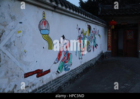 Deyang, Deyang, China. 20th Feb, 2017. Deyang, CHINA-February 20 2017: (EDITORIAL USE ONLY. CHINA OUT) .The wall of a house is decorated with Chinese traditional New Year paintings at a village in Mianzhu, Deyang City, southwest China's Sichuan Province, February 20th, 2017. Various New Year paintings can be seen everywhere in the village. Credit: SIPA Asia/ZUMA Wire/Alamy Live News Stock Photo