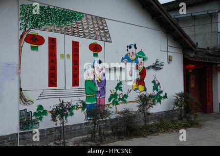 Deyang, Deyang, China. 20th Feb, 2017. Deyang, CHINA-February 20 2017: (EDITORIAL USE ONLY. CHINA OUT) .The wall of a house is decorated with Chinese traditional New Year paintings at a village in Mianzhu, Deyang City, southwest China's Sichuan Province, February 20th, 2017. Various New Year paintings can be seen everywhere in the village. Credit: SIPA Asia/ZUMA Wire/Alamy Live News Stock Photo