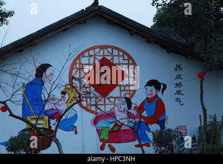 Deyang, Deyang, China. 20th Feb, 2017. Deyang, CHINA-February 20 2017: (EDITORIAL USE ONLY. CHINA OUT) .The wall of a house is decorated with Chinese traditional New Year paintings at a village in Mianzhu, Deyang City, southwest China's Sichuan Province, February 20th, 2017. Various New Year paintings can be seen everywhere in the village. Credit: SIPA Asia/ZUMA Wire/Alamy Live News Stock Photo