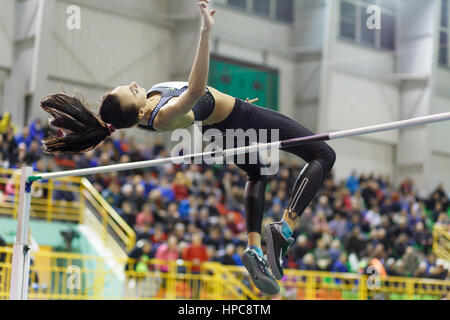 SUMY, UKRAINE - FEBRUARY 17, 2017: Iryna Gerashchenko jumping over bar in final High Jump competition of Ukrainian indoor track and field championship 2017. Stock Photo