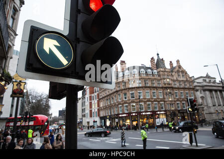 London, UK. 21st February, 2017. Police officers control traffic and pedestrians at a major intersection between the Strand, Aldwych and Waterloo Bridge where all traffic lights were simultaneously stuck on red. Credit: Mark Kerrison/Alamy Live News Stock Photo