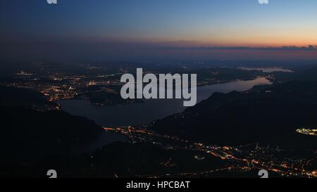 Lucerne and lake Vierwaldstattersee by night. View from mount Stanserhorn. Stock Photo