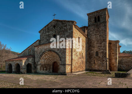 Collegiate, church, romanic of Santa Cruz in Castañeda, Cantabria, Spain Stock Photo