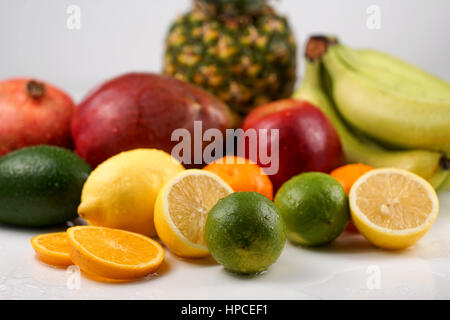 Collection of different tropical fruits on white background Stock Photo