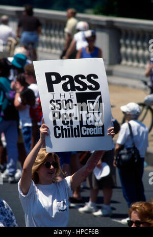 Thousands of people gather in a march across the Memorial bridge from Arlington cemetary to the Lincoln Memorial in Washington DC.  In a demostration for children organized by Marian Wright Edelman of the Children's Defense Fund June 1st, 1996 Photo By Mark Reinstein Stock Photo