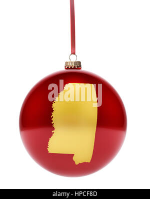 A hanging glossy red bauble with the golden shape of Mississippi.(series) Stock Photo