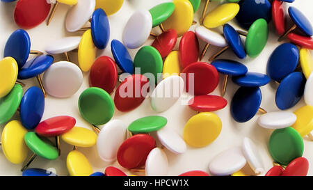 Colored push pins on a white background Stock Photo