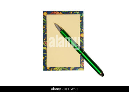 Colored notepad and a black pen on a wooden background Stock Photo