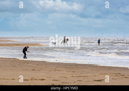 A horse and rider in the surf at Talacre Beach, Wales Stock Photo