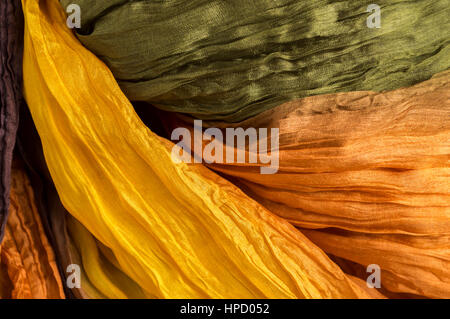 colored crinkled crumpled silk fabric textured Stock Photo