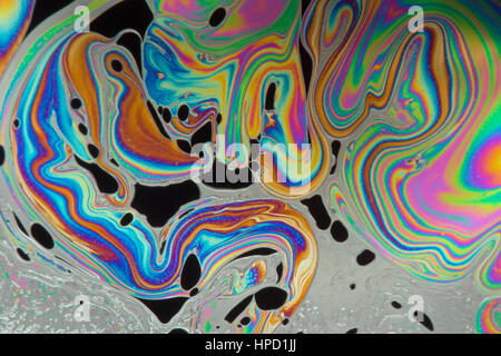 Psychedelic abstract formed by light on the surface of a soap bubble Stock Photo