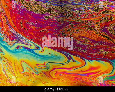 Psychedelic patterns formed on the surface of soap bubbles Stock Photo