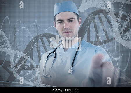 Surgeon pretending to be using futuristic digital screen against red spiral dna pattern Stock Photo