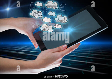 Hands using digital tablet against white background against circuit board on futuristic background Stock Photo