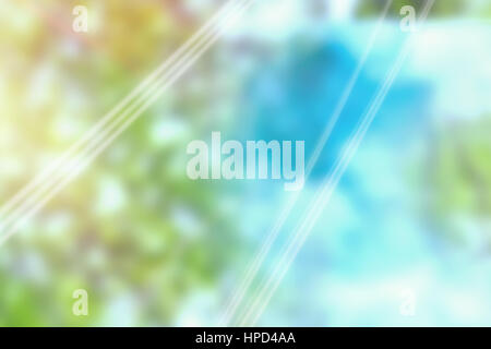 Coloured background with shiny lines against trees against sky Stock Photo
