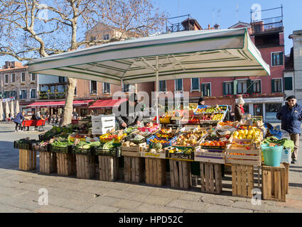 A street vendor selling fruits and vegetables in Venice, Italy. Stock Photo