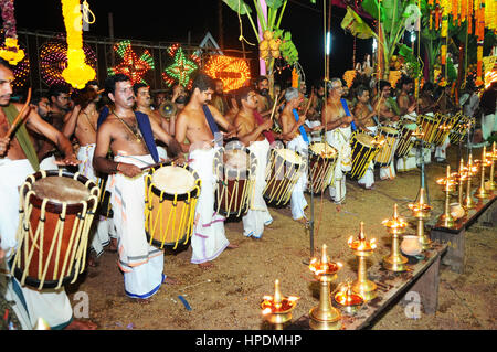 Chenda Melam (Temple Musics playing with Traditional Drums) by Lot of Artists, Temple Hindu festival Kerala, India (Photo Copyright © by Saji Maramon) Stock Photo