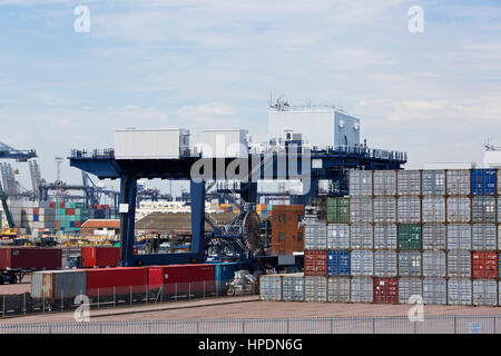 Cranes and containers waiting for loading or unloading at Felixstowe container port, UK Stock Photo