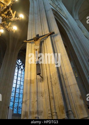 Jesus on a wooden cross, Saint-Pierre-et-Saint-Paul cathedral, Nantes, France. Stock Photo