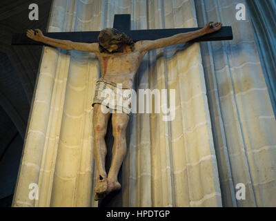 Jesus on a wooden cross, Saint-Pierre-et-Saint-Paul cathedral, Nantes, France. Stock Photo