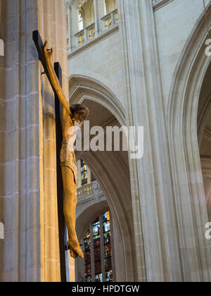 Jesus on a wooden cross, Saint-Pierre-et-Saint-Paul cathedral, Nantes, France. Stock Photo