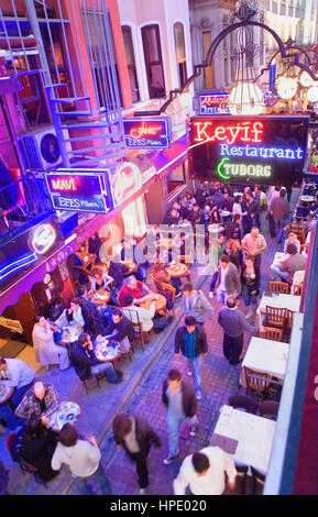 Bars and restaurants in Nevizade street, near Istiklal pedestrian street in Beyoglu area Istanbul, Turkey Stock Photo