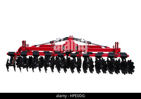 Tractor disc Harrow for preparing the ground. Isolated. Stock Photo