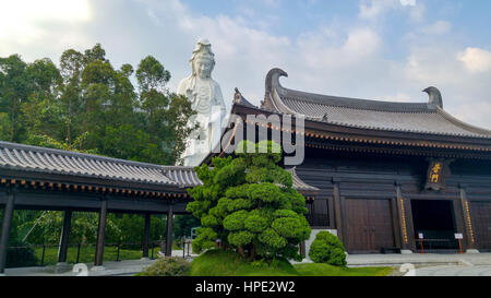 Guanyin statue and Universal Door Hall in Tsz Shan Monastery Stock Photo