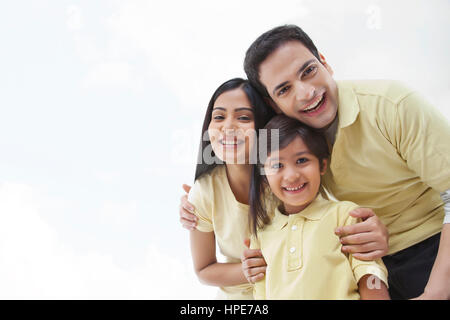 Studio portrait of couple together with son Stock Photo