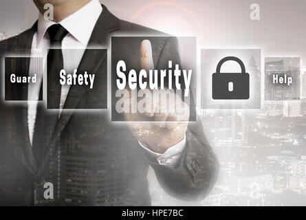 Security businessman with city background concept. Stock Photo