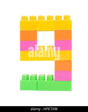 colorful plastic blocks forming the number nine isolate Stock Photo