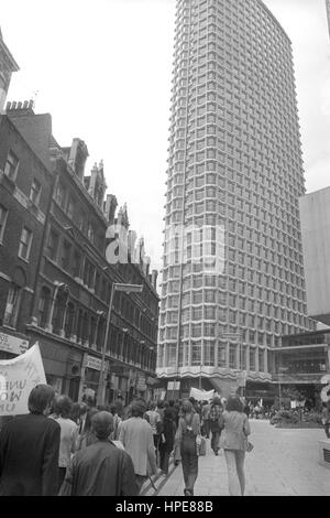A 'homes for all' demonstration today at Centre Point , the controversial unoccupied skyscraper at St Giles Circus in central London. The meeting followed a march from Islington Town Hall. Stock Photo
