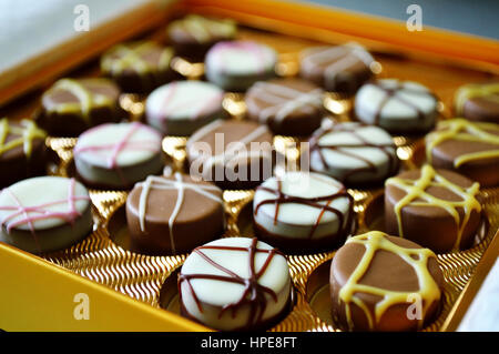 A box of mixed flavour Swiss chocolates Stock Photo